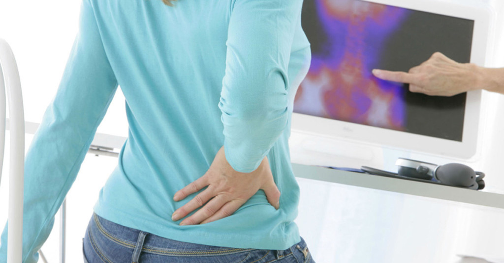 Почему может болеть поясница на ранних сроках беременности, что делать при болях в спине?