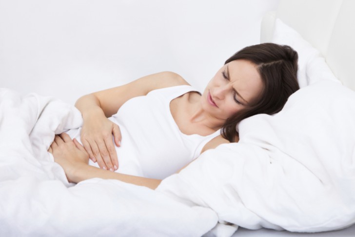 Пульсирует внизу живота во время беременности: как избавиться от пульсации?