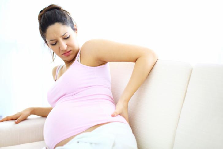 Болит крестец у женщины при беременности: почему возникают боли на ранних и поздних сроках и что делать?