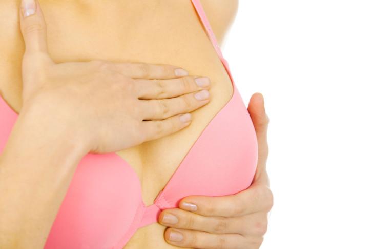 Почему в середине цикла болят грудные железы: причины набухания и дискомфорта