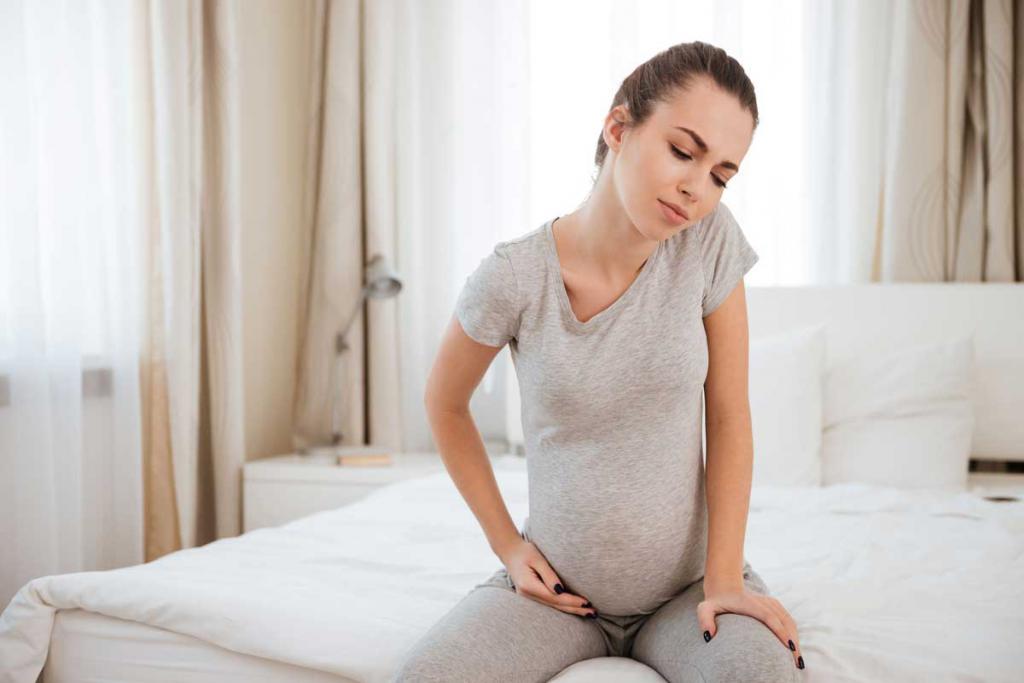 Белые выделения на ранних и поздних сроках беременности: творожистые и жидкие, слизистые и кремообразные
