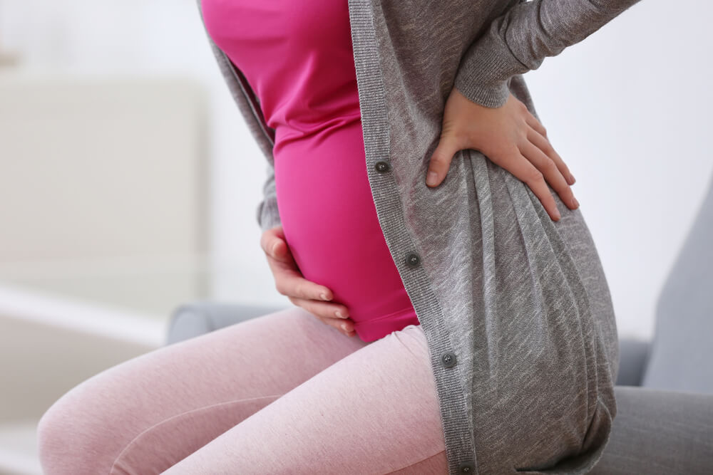 Болит низ живота во время беременности: опасно ли эта боль и что делать?